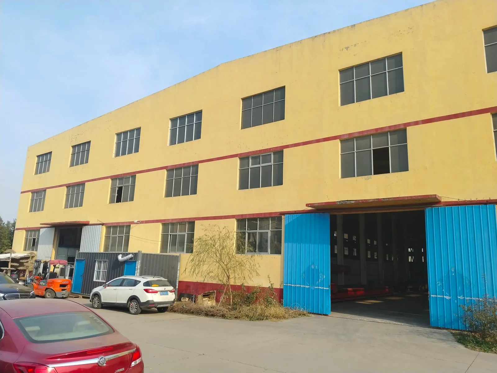 Haonuo factory building exterior with assembly bays in Qingzhou