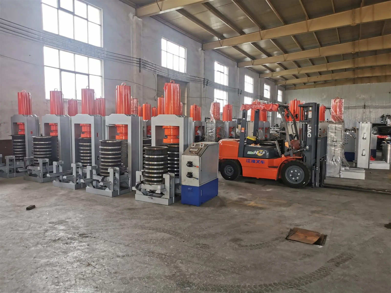 Finished hydraulic oil presses lined up before dispatch