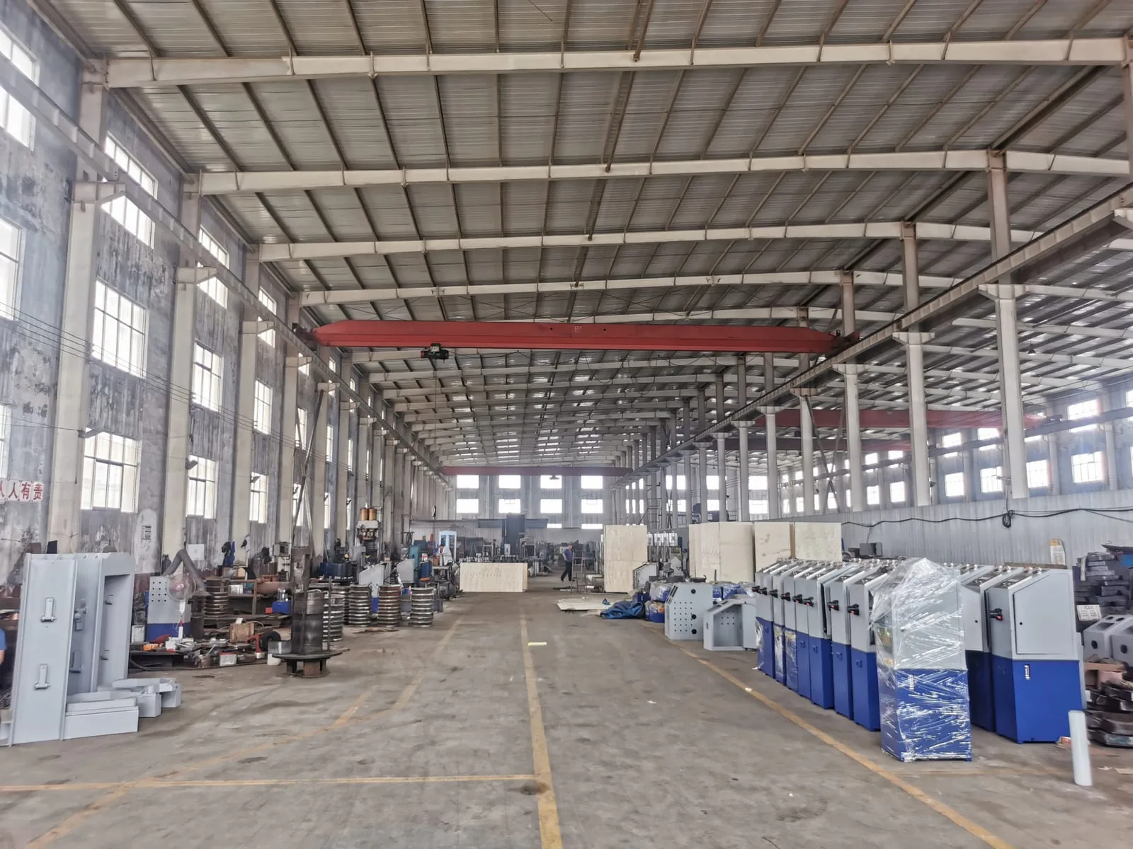Haonuo assembly workshop with overhead crane bays and hydraulic oil presses in production